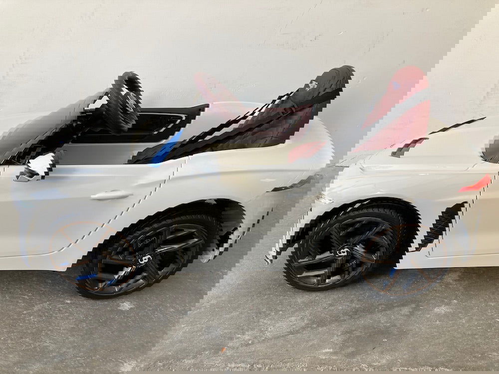 Elektrische kinderauto Bentley Bacalar 12 volt wit - RideCars