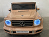 Elektrische kinderauto Mercedes G500 beige 12 volt - RideCars