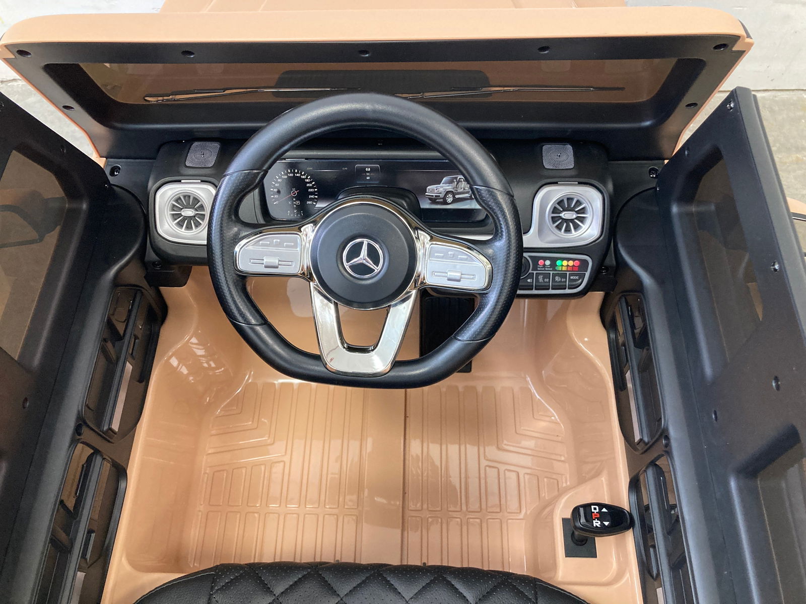 Elektrische kinderauto Mercedes G500 beige 12 volt - RideCars
